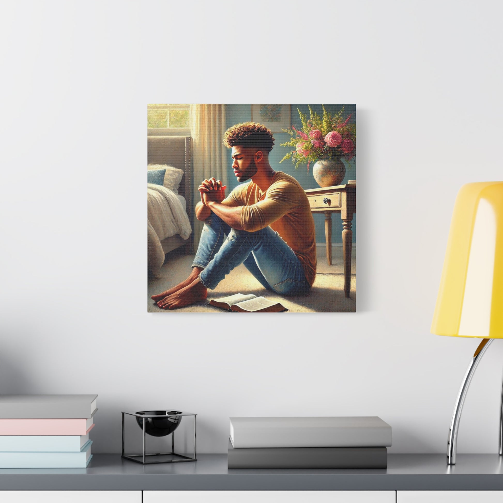 Canvas print of a black man sitting on a bed in a bedroom setting.